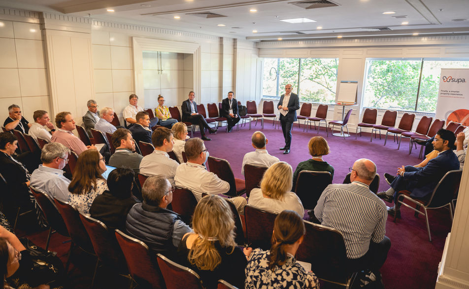 Audience seated in a conference session